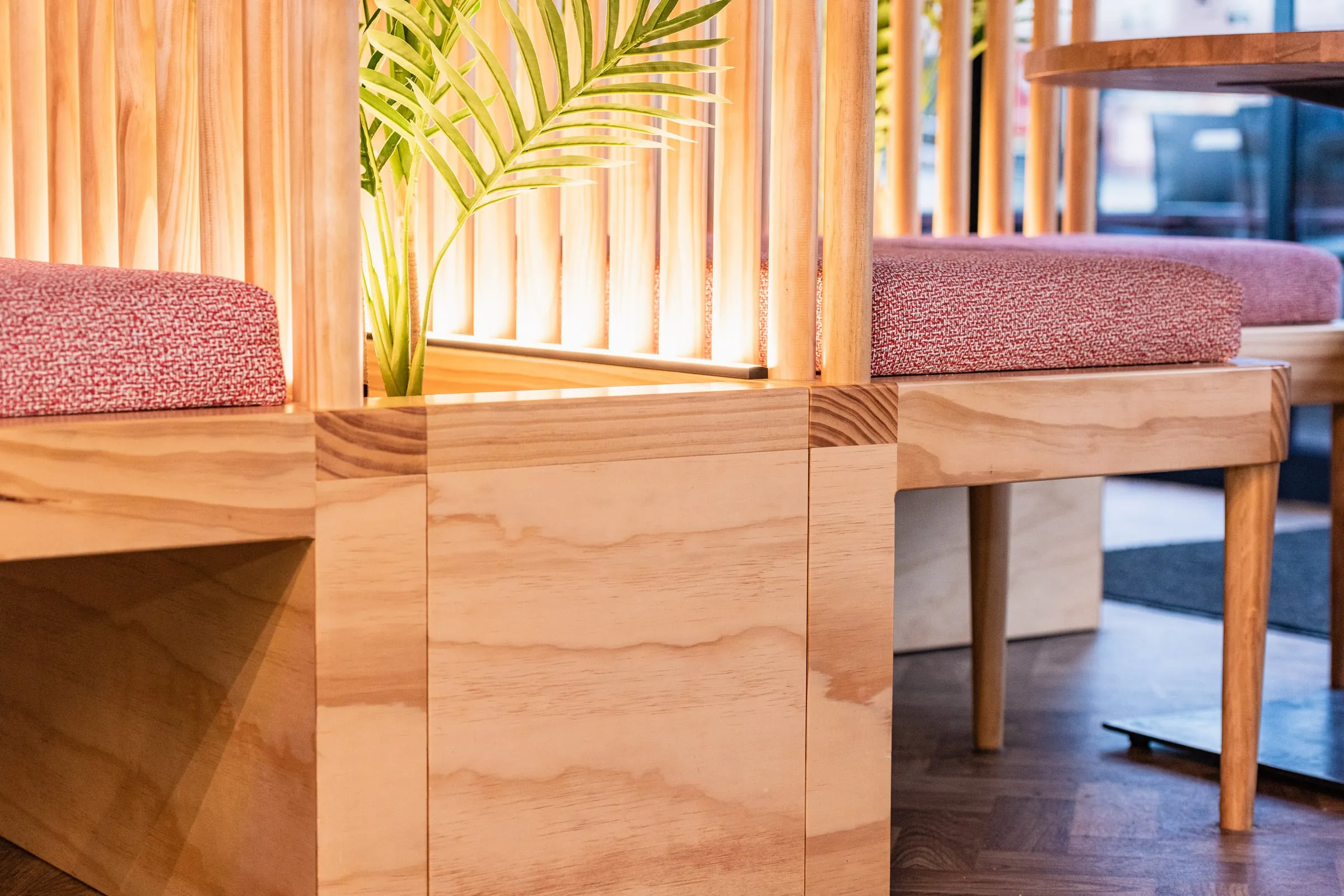 Ply plinth boxes meeting the dowel screen above a concealed LED channel