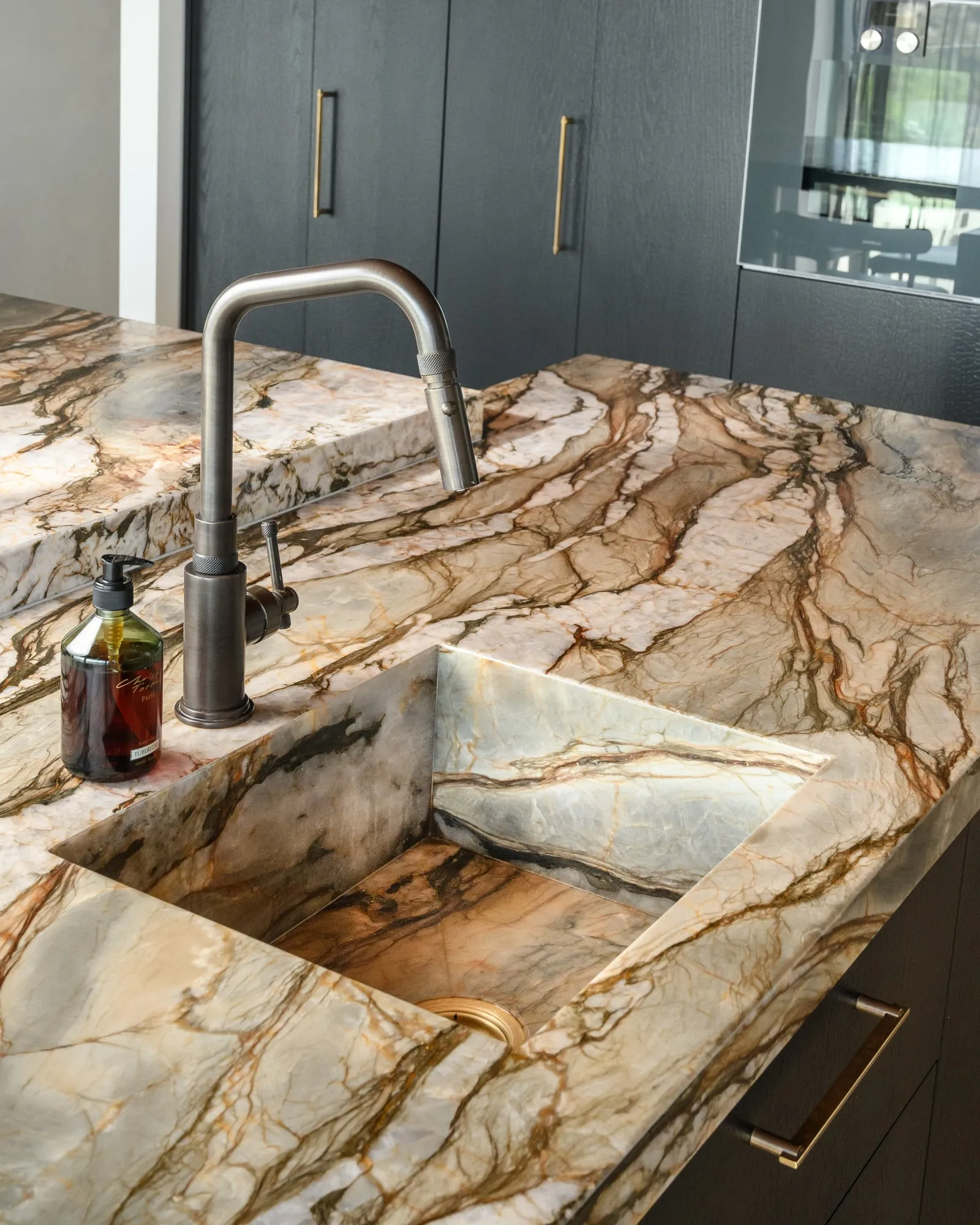 Integrated Quartzite sink with brass waste and gunmetal tap