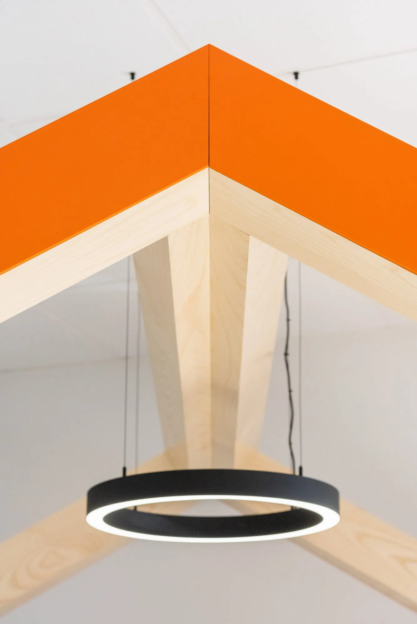 Lacquered orange bulkhead on clear Ash posts with black ring pendant